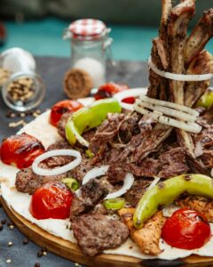 Delicious Azerbaijan kebab platter with vegetables