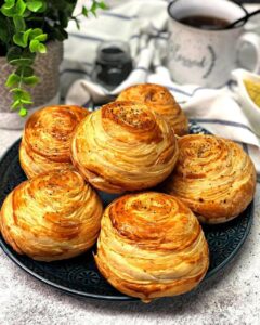 Golden, flaky pastries on a plate - Azerbaijan cuisine 